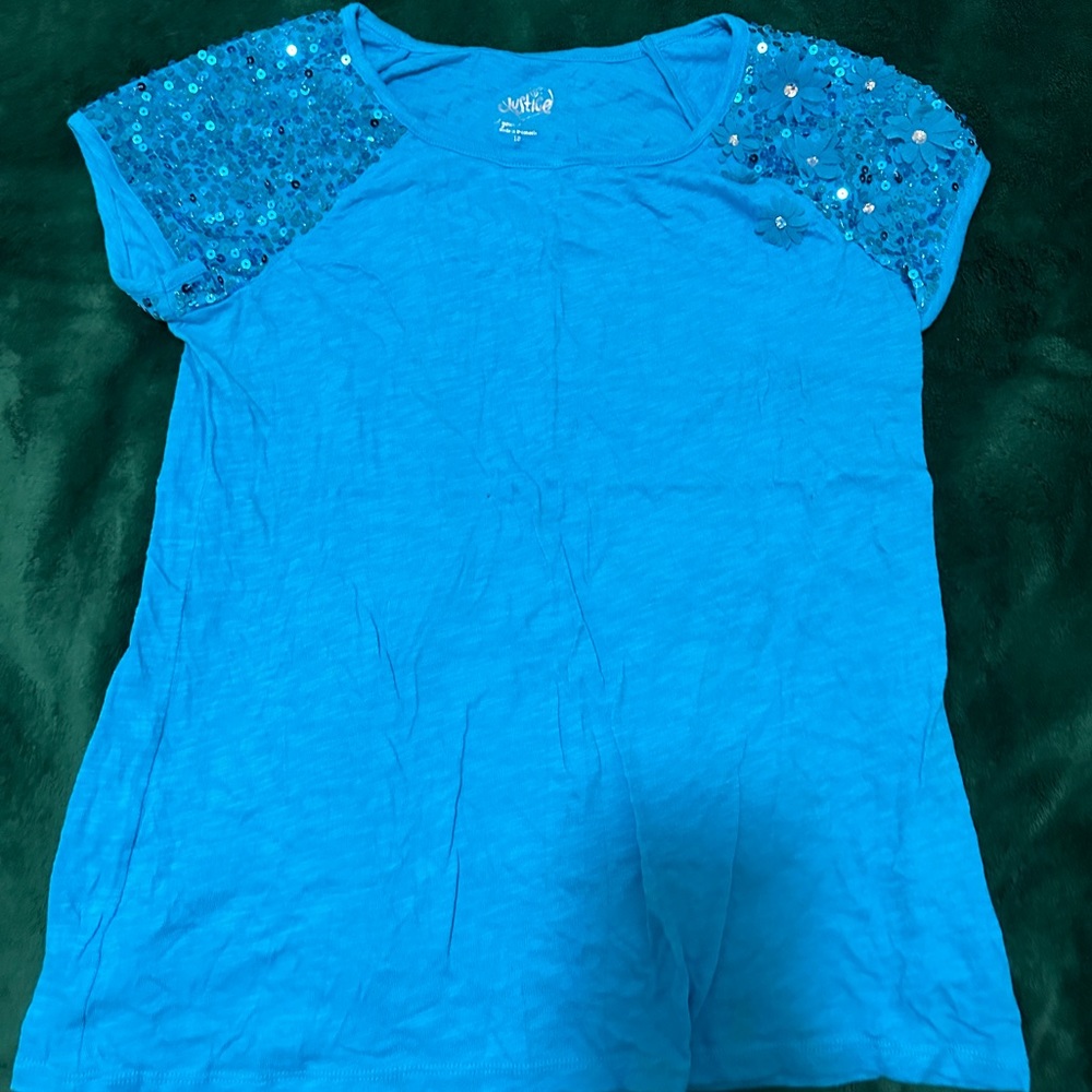 Justice girl’s short sleeve shirt, color light blue, size 18